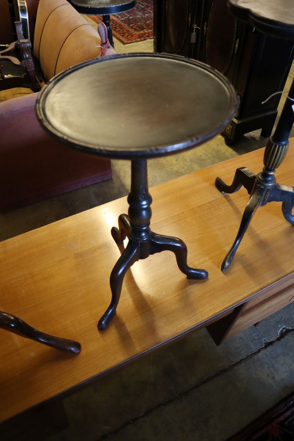 A 1920s chinoiserie lacquer tripod table, height 54cm and three others